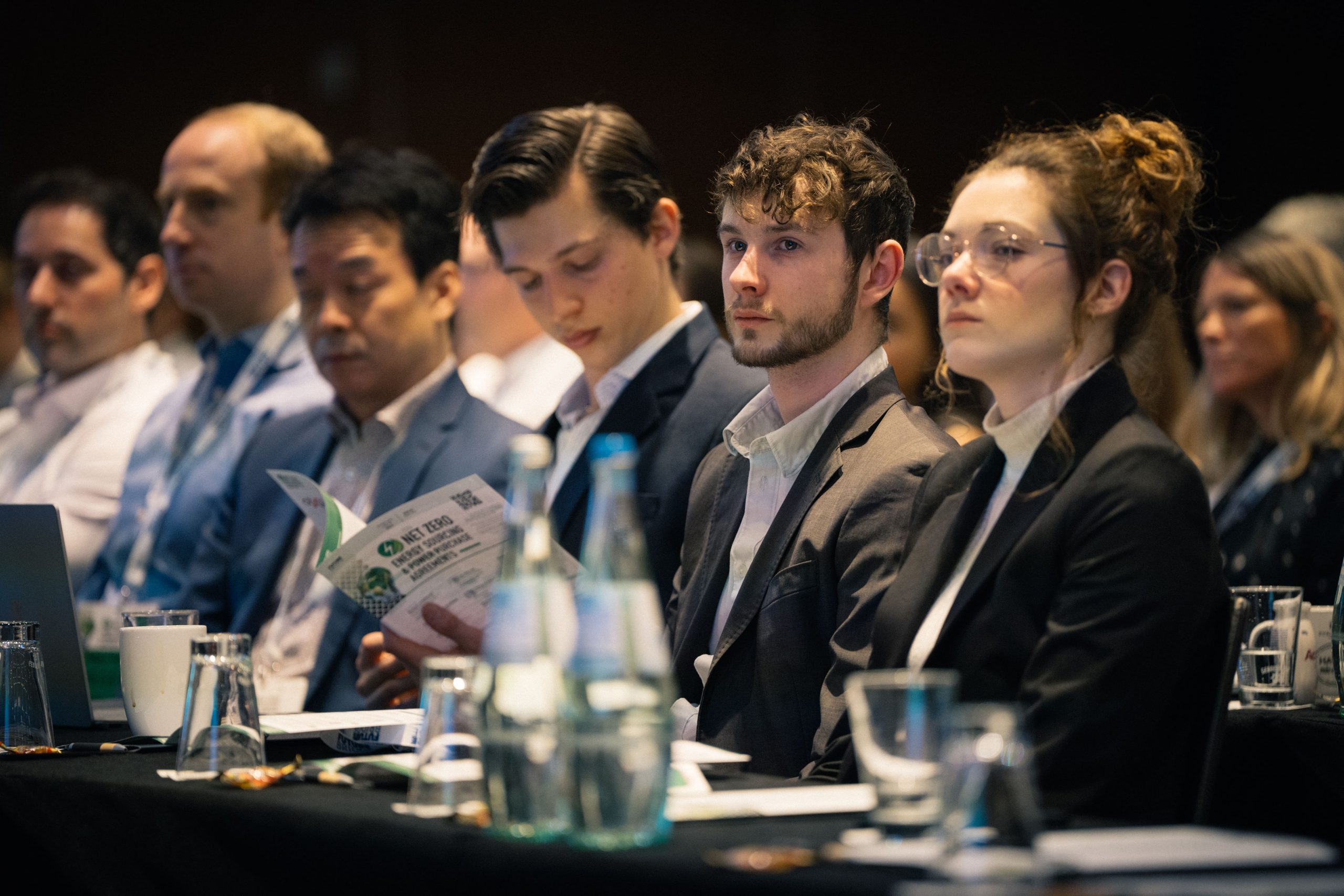 Delegates networking at a past Future Bridge summit