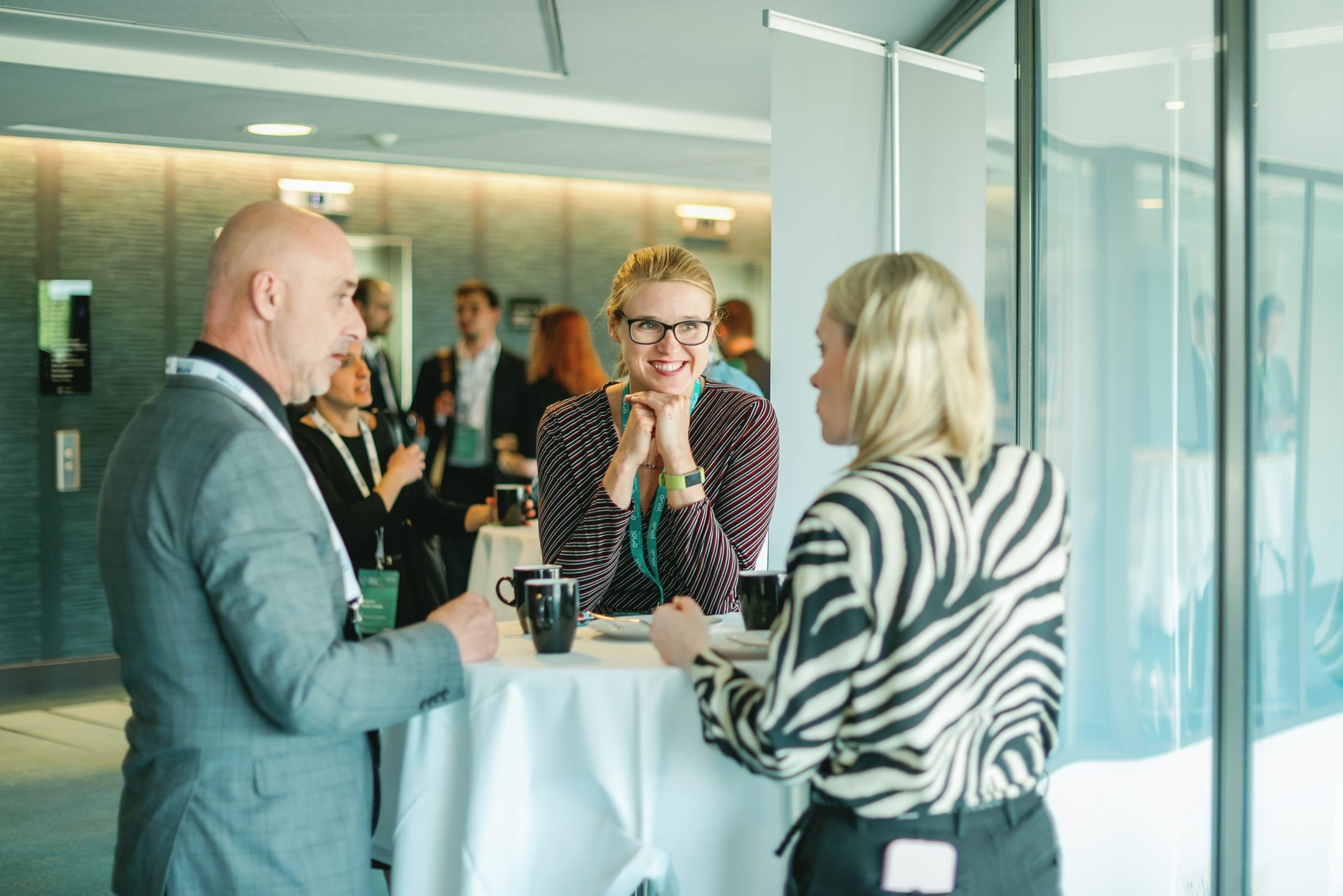 Coffee break networking at a past summit