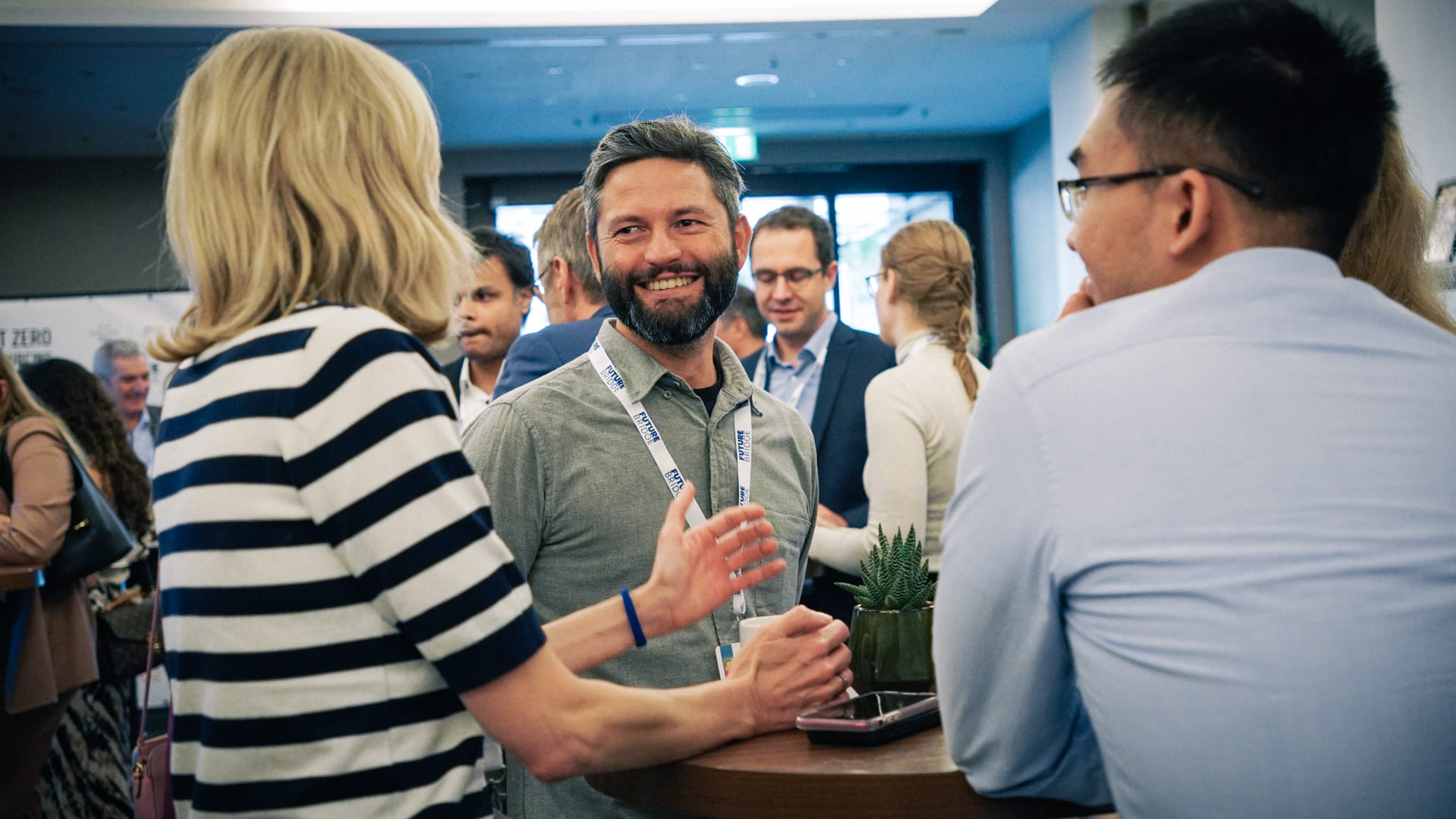 Delegates in conversation at a Future Bridge conference